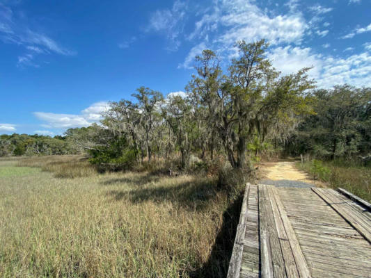 6026 ADMIRAL BLAKE LN, WADMALAW ISLAND, SC 29487, photo 4 of 14